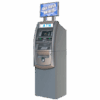 A standalone ATM machine with a sign reading 'Get Cash Here'.